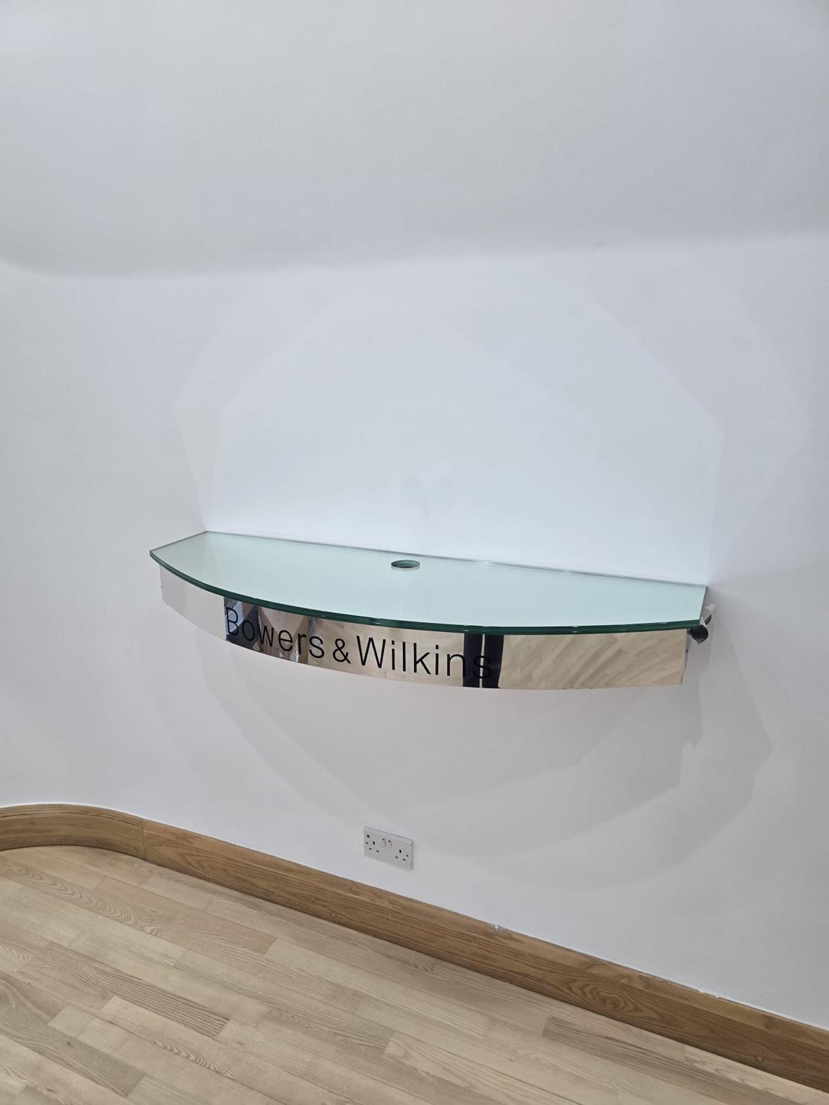 Curved glass shelf with mirrored splashback, Bowers & Wilkins showroom