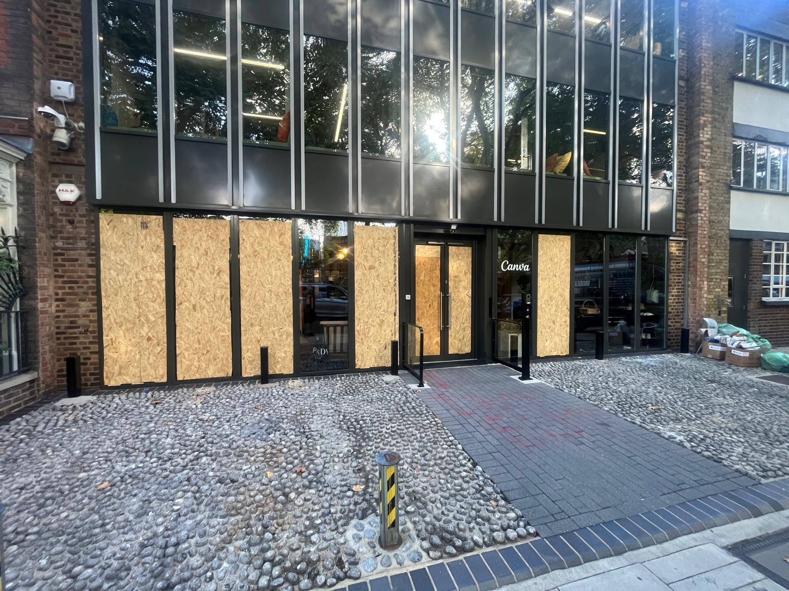 Commercial shopfront with structural glass and vertical aluminium fins